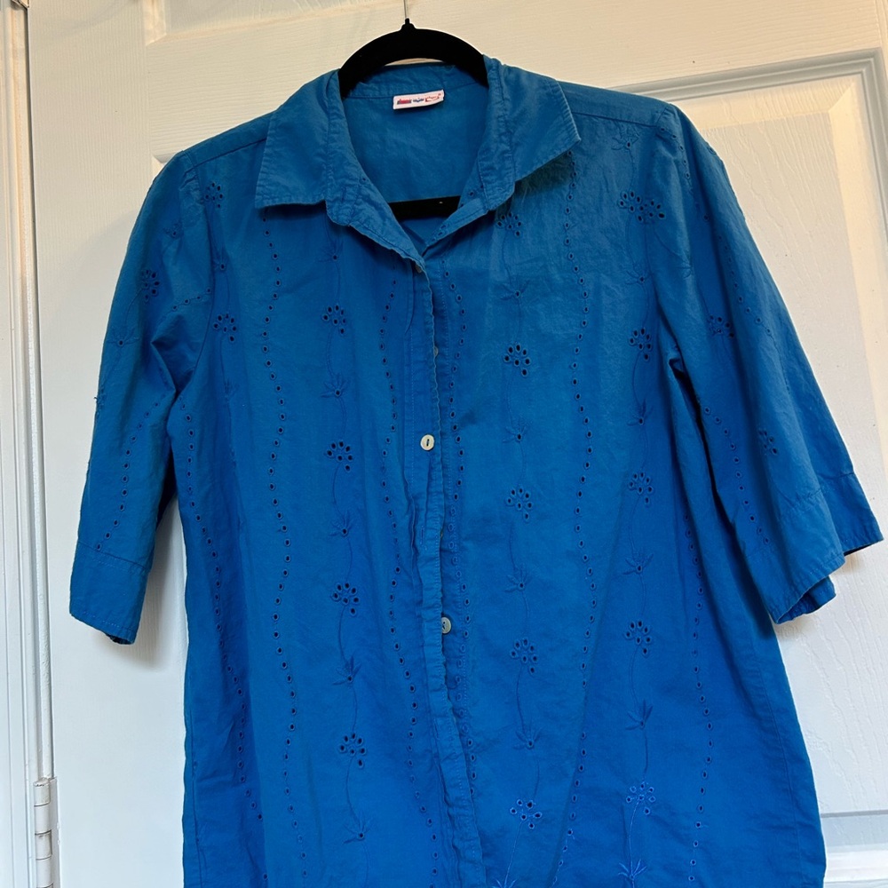 button-up blouse with embroidered flower details